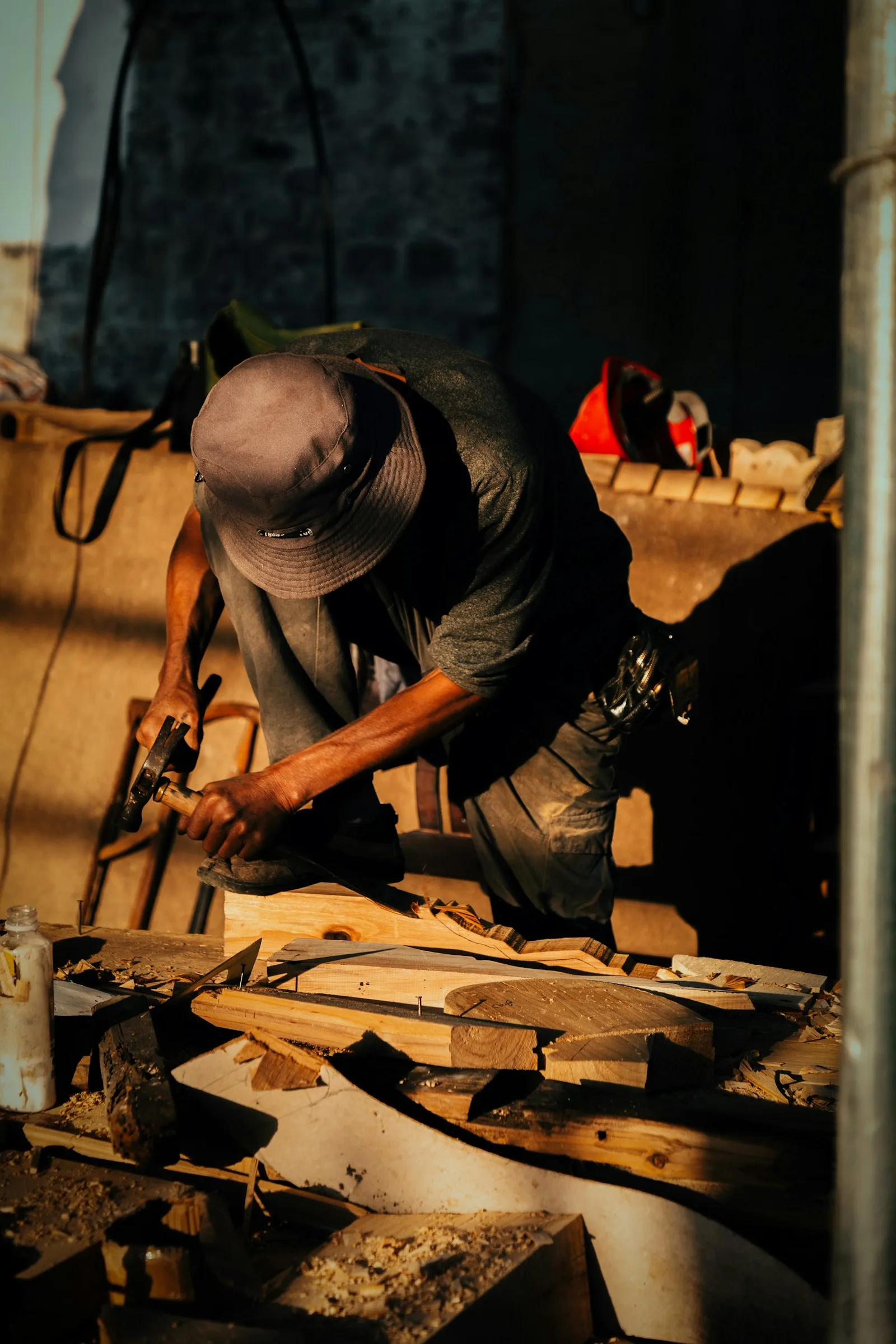 Carpenter working with wood in a workshop