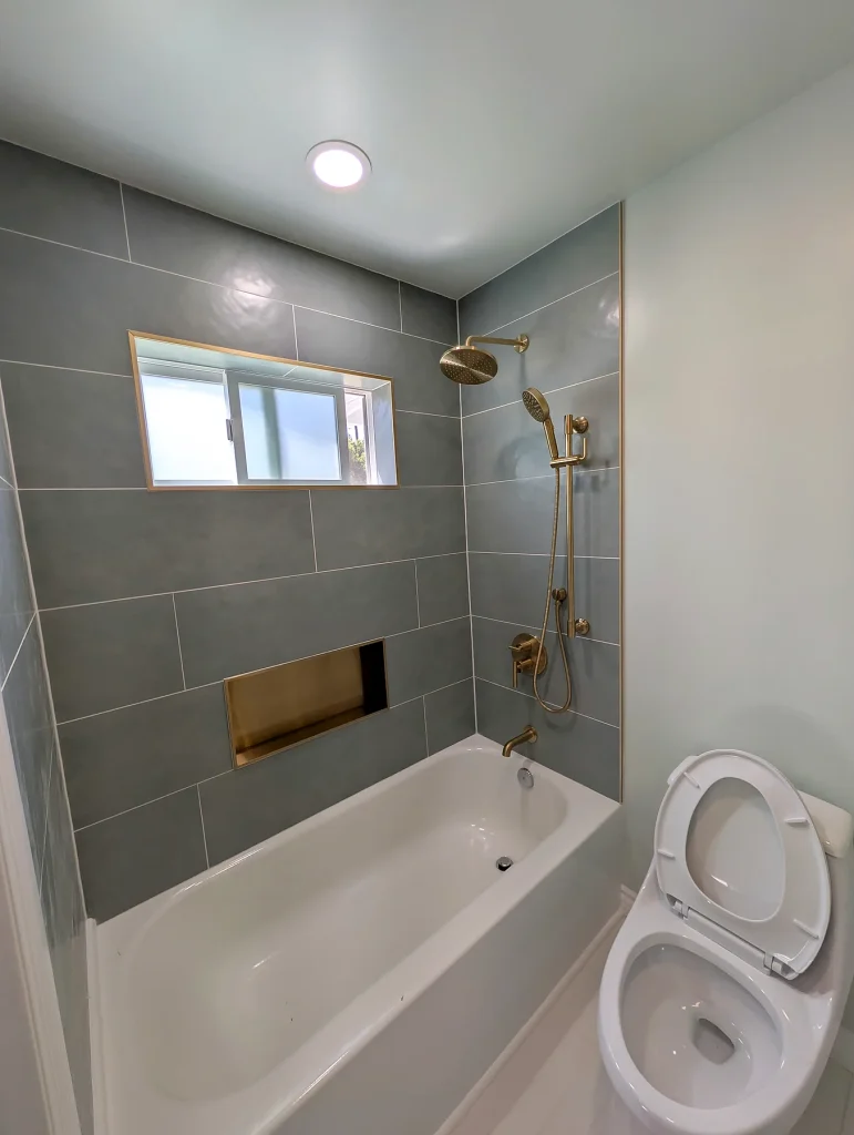 Bathtub Tile and Gold Fixtures — Bathtub and Tile Remodel
