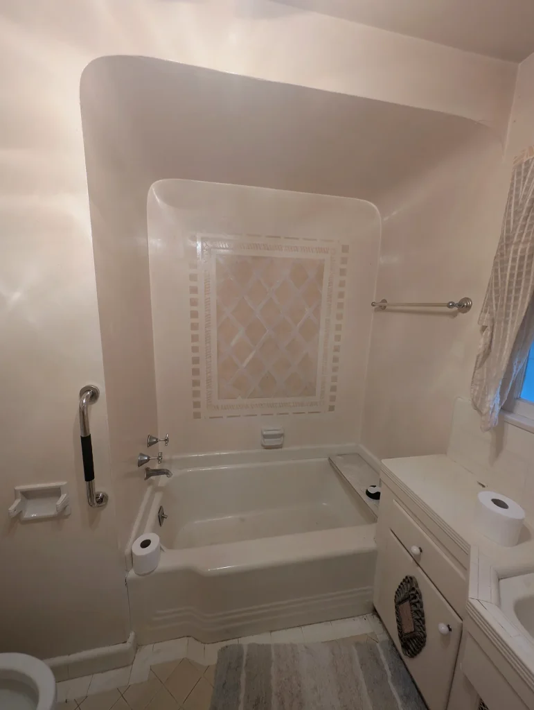 Bathroom Existing Tub and Vanity — Beam-Ceiling Room & Bathroom Remodel