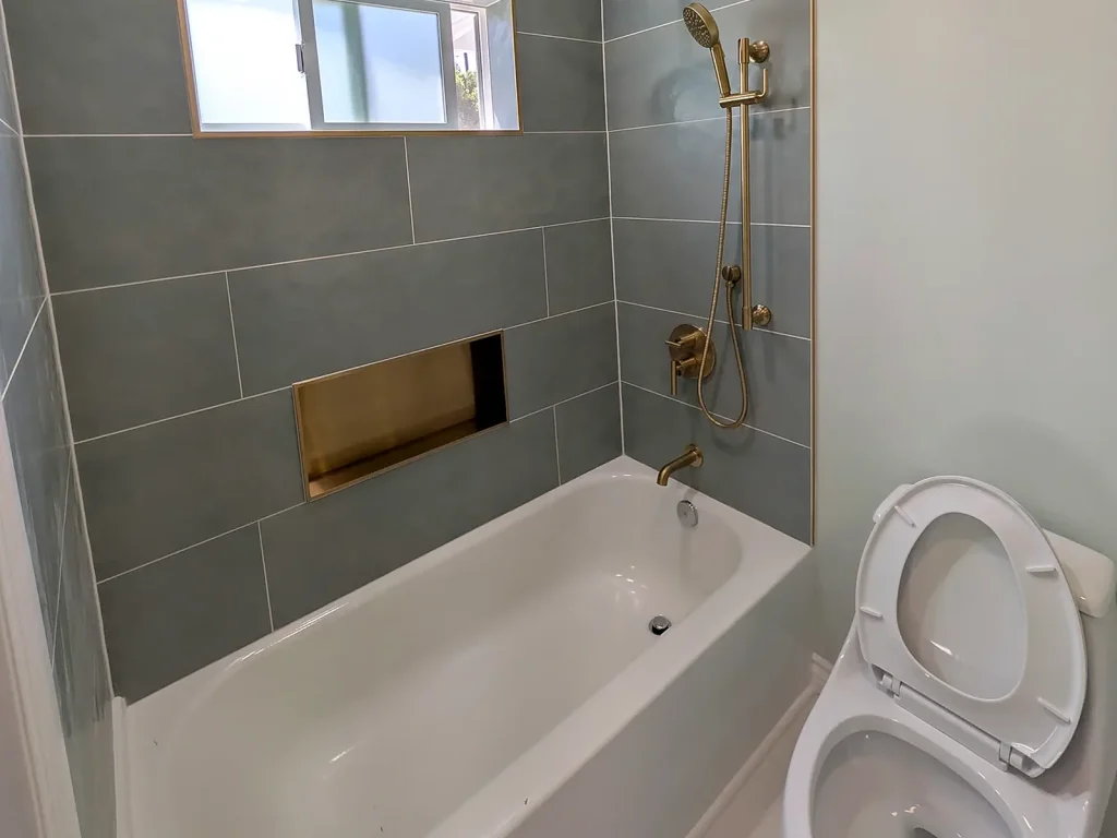 Bathtub Tile and Gold Fixtures — Bathtub and Tile Remodel